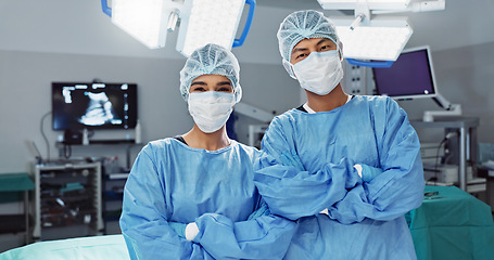 Image showing Team, doctor and arms crossed with mask of professional in ICU for surgery, healthcare or procedure at hospital. Medical surgeon people in confidence, expert or teamwork for emergency care at clinic