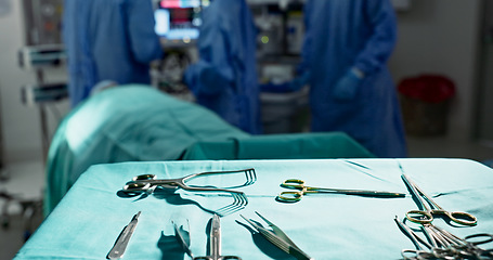 Image showing Surgery, health and tools in operation theatre, help in medicine with treatment and closeup of equipment on table. Metal, medical and surgical instrument with doctor people at hospital for healthcare