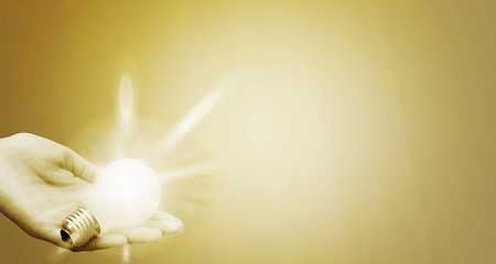 Image showing Background with lit lightbulb