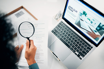 Image showing Magnifying glass, laptop and woman reading document in the office for company recruitment website. Research, technology and closeup of female designer with hiring paperwork and computer in workplace.