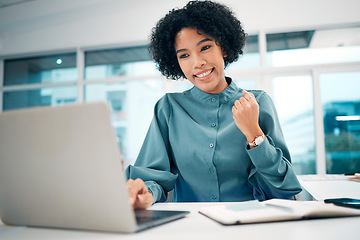 Image showing Happy woman, laptop and fist pump in winning, success or promotion for bonus or good news on office desk. Female person smile on computer in celebration, victory or achievement on table at workplace