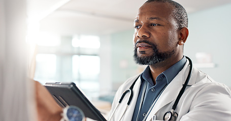 Image showing Healthcare, black man and doctor with a tablet, digital app or connection with online results, internet or network. Person, employee or medical professional with technology, website info or research