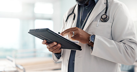 Image showing Closeup, man and doctor with a tablet, internet or connection with online results, digital app or typing. Person, employee or medical professional with technology, healthcare or website information