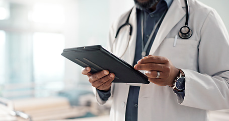 Image showing Closeup, man and doctor with a tablet, internet or connection with online results, digital app or typing. Person, employee or medical professional with technology, healthcare or website information