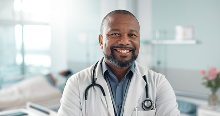 Image showing Healthcare, doctor and black man with arms crossed at hospital with smile for support, service and wellness. Medicine, professional and African expert with happiness and pride for career or surgery