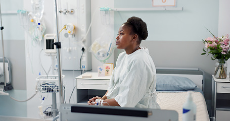 Image showing Patient, hospital and thinking on bed with depression, sad and pulmonary disease diagnosis with sadness. Black woman, treatment and recovery in medical center, chest pain and emergency healthcare