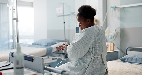 Image showing Patient, hospital and thinking black woman after medical surgery for healthcare service, assessment or treatment. Consultation, medicine and sick person is sad in a clinic for health and depressed