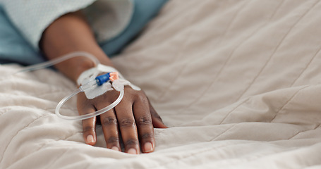 Image showing Person hand, bed and drip in closeup, clinic or treatment for hydration, liquid or supplement. Patient, healthcare and wellness with blood transfusion, anesthesia or pharma drugs for pain in hospital