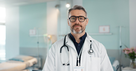 Image showing Healthcare, doctor and man with arms crossed at hospital with smile for support, service and wellness. Medicine, professional and expert with glasses and pride for career, surgery, insurance and care