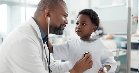 Image showing Doctor, African kid and stethoscope for breathing, check or smile for recovery from surgery, treatment or health. Child patient, medic or tools for medical exam, inspection or talk for rehabilitation
