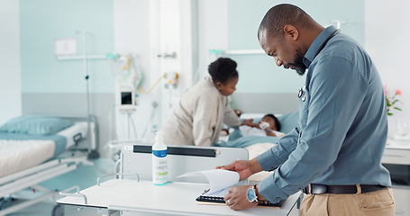 Image showing Doctor, writing and hospital documents for patient, family or child insurance, checklist and healthcare history. Professional african man or pediatrician in medical clinic with paperwork or charts