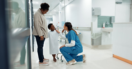 Image showing Black family, healthcare and a pediatrician talking to a patient in the hospital for medical child care. Kids, trust or medicine and a nurse consulting a boy with his mother in the clinic for health