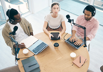 Image showing Radio, technology or broadcast with a content creator team in the office from above for streaming or recording. Podcast, microphone and influencer friends in a studio together on a creative platform