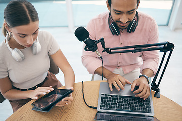 Image showing Radio presenter, technology and teamwork for podcast, content creation and planning with laptop or tablet. Talk show, man and woman in studio with headphones for collaboration with broadcast or media