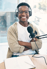 Image showing Portrait, radio and black man with a notebook, microphone and arms crossed with content creator, live stream and news. Face, African person or podcast presenter with tech, share information and media