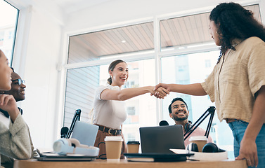 Image showing Communication, smile and podcast people shaking hands for hello, teamwork or welcome media guest, influencer or presenter. Thank you handshake, interview and broadcast group happy for radio talk show