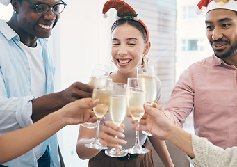 Image showing Champagne, Christmas party and toast with group of people at office, celebration and fun with holiday and alcohol. Wine, cheers and employees at work event for Xmas, happy and diversity with drinks