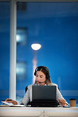 Image showing Business woman, notebook and call center communication, planning and night advice, support or writing a reminder. FInancial advisor or virtual agent speaking on laptop and notes for help with loan