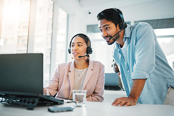 Image showing People at call center, training with manager and help, laptop and support with CRM process, customer service and telecom. Working together, team and coaching in office with telemarketing and advice