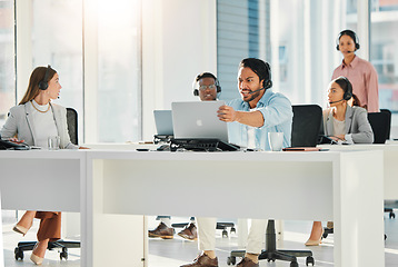 Image showing Angry man, call center and laptop in mistake, fail or difficult customer in contact us at office. Frustrated businessman, consultant or agent grabbing computer in anger management, debt or bankruptcy