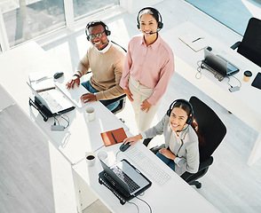 Image showing Call center, staff group and smile in portrait with laptop, telemarketing staff and voip tech from above. Women, man and customer service agent for contact us, technical support and consulting team