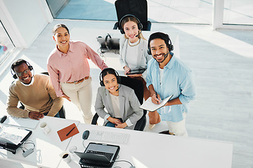 Image showing Happy telemarketing team, portrait and group in call center for customer service, IT support or collaboration in coworking agency from above. Diversity, sales people and smile for consulting together