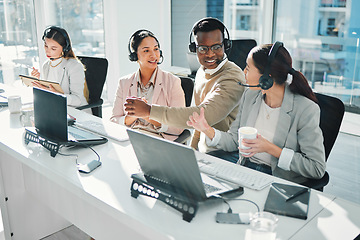 Image showing Call center, staff group and talk at help desk with laptop, telemarketing or voip tech with problem solving. Women, man and customer service agent for contact us, technical support or consulting team
