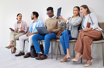 Image showing Group of people, waiting room and interview at job recruitment agency with laptop, tablet and resume. Human resources, hiring and business men and women in lobby together with career opportunity.