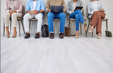 Image showing Legs, business people and technology in waiting room for internet, networking and cv application in a row. Men, women and group feet together for interview, recruitment or we are hiring at company