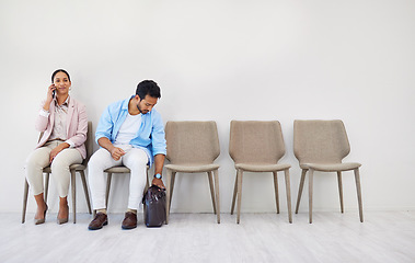 Image showing Creative people, waiting room and chairs in hiring, row or opportunity together at office. Group of employees sitting in line for recruiting, meeting or team in startup for job or career at workplace