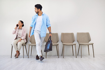 Image showing People, waiting room and businessman walking to interview at job recruitment agency together. Human resources, hiring and diversity, man and woman in office lobby with professional career opportunity