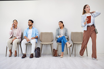 Image showing People, waiting room and businesswoman walking to interview at job recruitment agency. Human resources, hiring and diversity, men and women in lobby together with professional career opportunity.