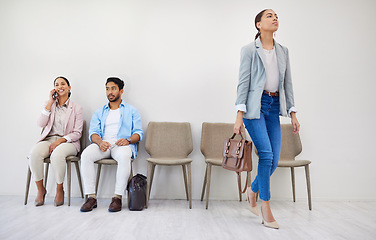 Image showing Business people, waiting room and chairs in hiring, row or opportunity together at office. Group of employees sitting in line for recruiting, meeting or team in startup for job or career at workplace