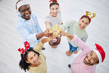 Image showing Portrait, toast and a business team at a Christmas office party together for celebration event from above. Diversity, happy or champagne with an employee group of men and woman in the workplace