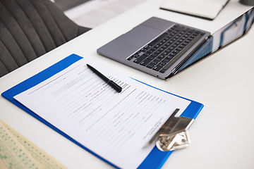 Image showing Insurance, office and checklist with laptop on table in hospital for survey, information and health data. Paperwork, questions and computer with form for medical results, report and healthcare review