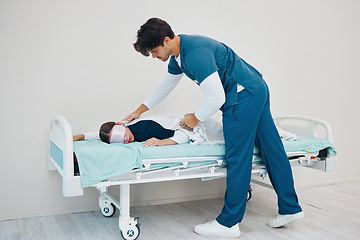 Image showing Sleeping, hospital and tired nurse on bed for rest, nap and break for burnout, exhausted and fatigue. Healthcare, blanket and health workers relax for medical service, wellness and stress in clinic