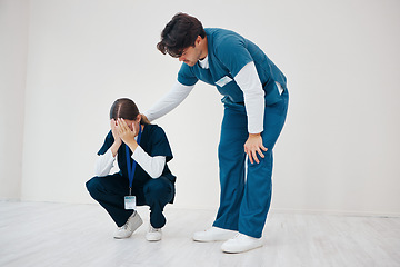Image showing Crying doctors, man and woman in team, clinic floor or stress for support, empathy or regret. Medic partnership, sad and depression for mistake, anxiety or healthcare in hospital for death in surgery