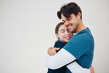 Image showing Doctor, colleagues and hug happy at healthcare clinic, support or work. Medical professional, couple of friends or helping comfort or team in scrubs on white background, mockup or trust at hospital