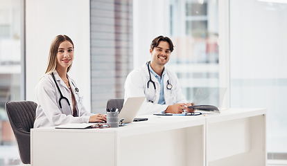 Image showing Portrait, laptop and healthcare with a team of doctors in the hospital for medical collaboration you can trust. Smile, computer or teamwork with a woman and man medicine professional in a clinic