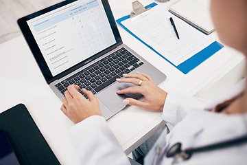 Image showing Laptop, hands or doctor with research, medical update or telehealth web service in hospital clinic. Woman, screen or surgeon working in professional healthcare typing on digital tech for email info