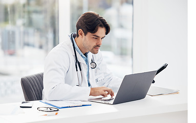 Image showing Laptop, news or doctor with research, medical update or telehealth web service in hospital clinic. Man, science or surgeon working in professional healthcare typing on digital tech for email info