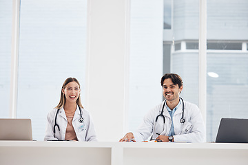 Image showing Portrait, laptop and medical with a team of doctors in the hospital for healthcare collaboration you can trust. Happy, medicine or teamwork with a woman and woman medicine professional in a hospital