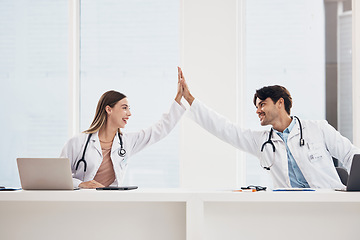 Image showing Success, high five or doctors in meeting for a strategy, goals or working in hospital for healthcare together. Man, happy woman or excited surgeons with nursing target, medical mission or teamwork