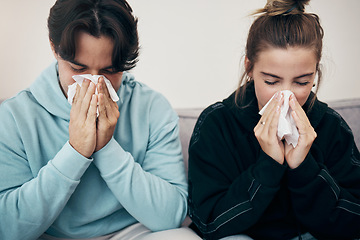 Image showing Couple, sick and couch with tissue, sickness and virus for infection, sinus and cold symptoms. Sneeze, blowing nose and allergy in living room sofa, hayfever and healthcare for disease, man and woman