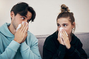 Image showing Couple, sick and virus with tissue, sofa and sickness for infection, sinus and cold symptoms. Sneeze, blowing nose and allergy in living room couch, hayfever and healthcare for disease, man and woman