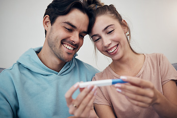 Image showing Pregnancy, test and smile of couple in home, reading good news or check positive results. Pregnant, stick and happy man and woman in living room excited for success, future maternity or ivf fertility