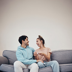 Image showing Pregnancy test, excited and couple on sofa in home, reading good news or check results on mockup space. Kit, happy man and pregnant woman in living room for success, future maternity or ivf fertility