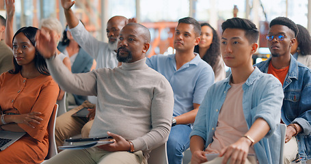 Image showing Audience, hand raised and question in seminar for presentation, convention and workshop for employees. People, faq and vote or asking in conference, team building and diversity in company in training