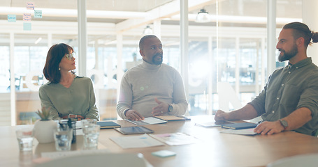 Image showing Meeting, discussion and business people in the office for working on a creative project in collaboration. Teamwork, diversity and group of designers in conversation for planning in modern workplace.