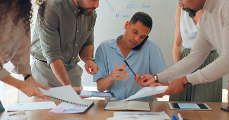 Image showing Phone call, multitasking and man with workflow crisis, business and conversation with planning, deadline and schedule. Chaos, manager and employees with admin, overworked or documents in a workplace